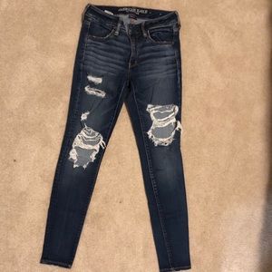 Distressed dark wash jeans
